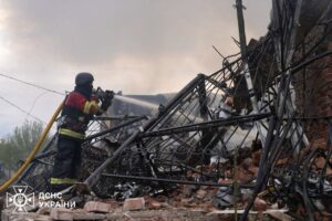 This handout photograph taken and released by the Ukrainian State Emergency Service shows a firefighter extinguishing the fire in a building following an air-attack amid the Russian invasion of Ukraine, in Sumy, northeastern Ukraine, May 6, 2025. (AFP Photo)
