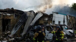 Firefighters work at the site of a Russian drone strike, outside of Kyiv, Ukraine, May 18, 2025. (Reuters Photo)