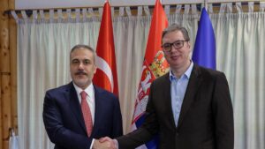 Foreign Minister Hakan Fidan shakes hands with Serbian President Aleksandar Vucic in Belgrade, May 19, 2025. (AA Photo)