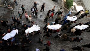Mourners carry the bodies of Palestinians killed in Israeli strikes during the funeral, in Gaza City, Palestine, May 20, 2025. (Retuers Photo)