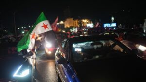 Syrians celebrate following Syrian President Ahmad al-Sharaa's speech after the lifting of U.S. sanctions on Syria, in Damascus, Syria, May 14, 2025. (EPA Photo)