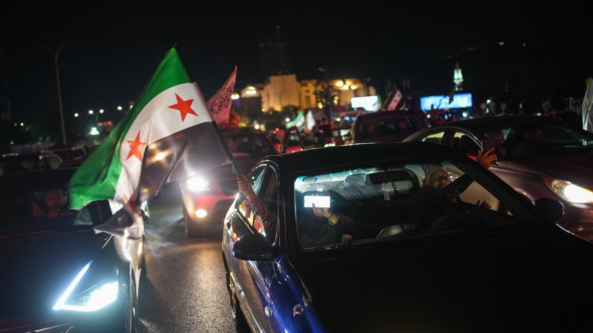 Syrians celebrate following Syrian President Ahmad al-Sharaa's speech after the lifting of U.S. sanctions on Syria, in Damascus, Syria, May 14, 2025. (EPA Photo)