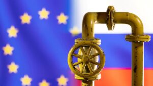 A model of the natural gas pipeline is seen in front of the EU and Russia flags in this illustration taken on March 8, 2022. (Reuters Photo)