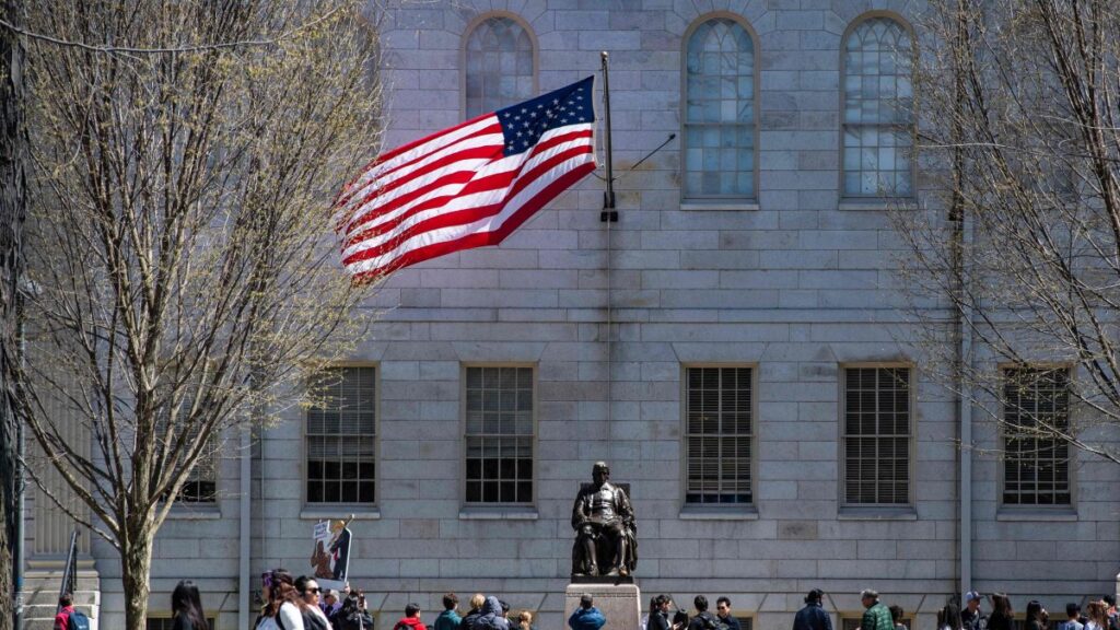 Demonstrators with signs stand around the John Harvard Statue in Harvard Yard following a rally against President Donald Trump’s attacks on Harvard University at Harvard University in Cambridge, Massachusetts, April 17, 2025. (AFP Photo)