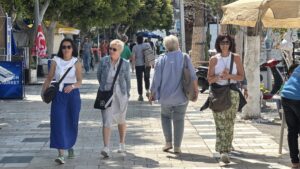 Tourists are photographed walking close to the Port of Marmaris in Bodrum, Muğla, southwestern Türkiye, May 2, 2025. (AA Photo)