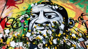 A mural of George Floyd is adorned with yellow roses and paper notes at George Floyd Square, in Minneapolis, Minnesota, U.S., May 23, 2025. (AFP Photo)