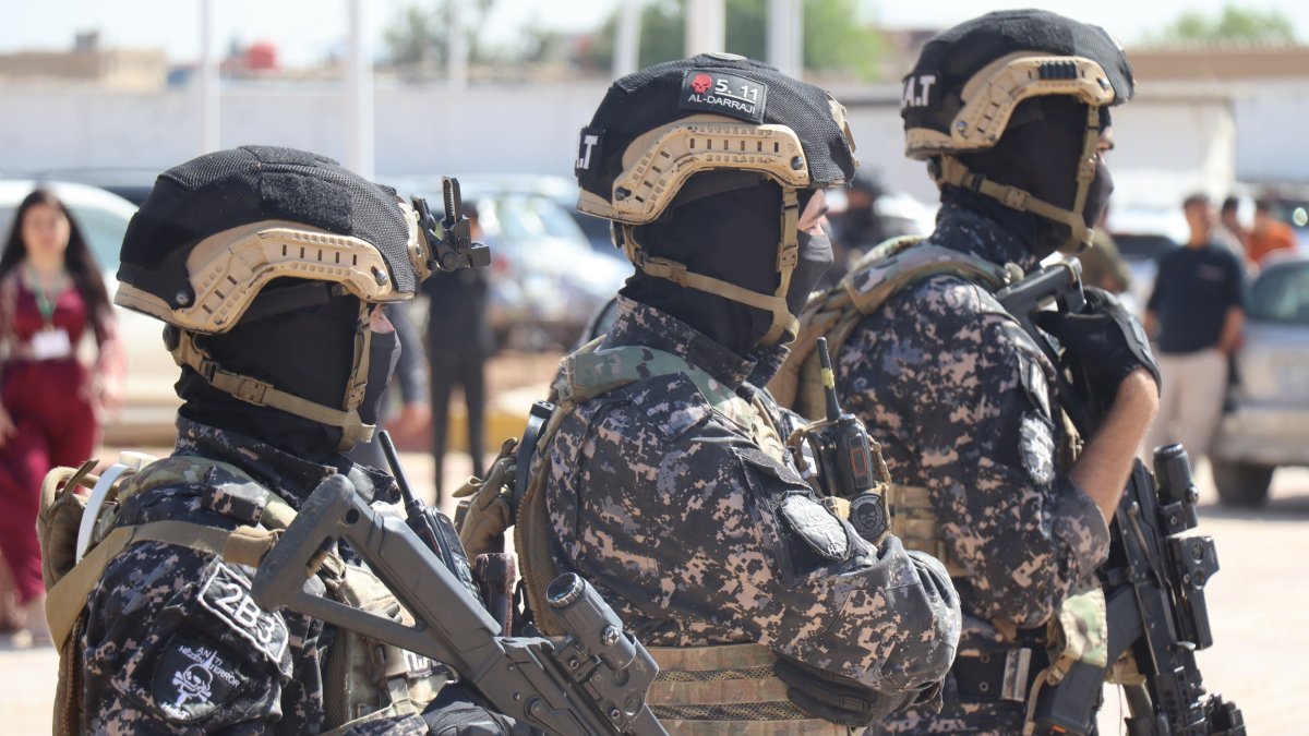 Members of the PKK-linked Syrian Democratic Forces (SDF) secure an area in Qamishli, northeast Syria, April 26, 2025.  (EPA Photo)