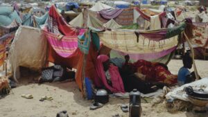 Women who fled war in Sudan rest in a refugee camp in Adre, Chad,  Oct. 5, 2024. (AP Photo)