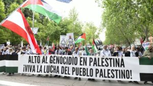 Protesters hold a banner reading 'Stop the Genocide in Palestine. Long live the struggle of the Palestinian people' during a pro-Palestinian rally to protest against the arms trade with Israel, in Madrid, Spain, May 10, 2025. (EPA Photo)