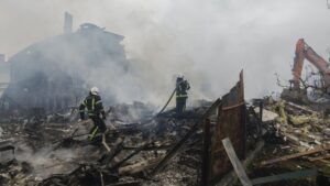 Ukrainian rescuers work at the site of a residential area struck by a rocket as a result of an overnight strike amid the ongoing Russian invasion, in a village near Kyiv, Ukraine, May 25, 2025. (EPA Photo)