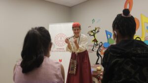 A teacher from the Istanbul Fairy Tale School explains a story to young patients during a Masalhane session, Istanbul, Türkiye, May 22, 2025. (AA Photo)