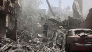 A Palestinian man inspects the rubble following Israeli strikes on the al-Qattaa family home in al-Tuffah neighbourhood in Gaza City, May 31, 2025. (AFP Photo)