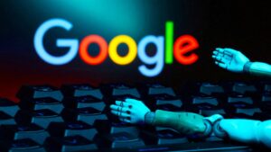 The Google logo, a keyboard and robot hands are seen in this illustration taken Jan. 27, 2025. (Reuters Photo)