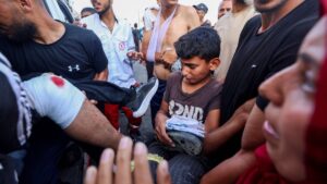 Palestinian rescuers evacuate injured people in an ambulance after an Israeli drone reportedly opened fire on civilian gatherings near an aid distribution point, central Gaza Strip, Palestine, June 1, 2025. (AFP Photo)