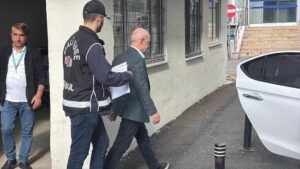 Police escort Büyükçekmece Mayor Hasan Akgün after his detention, Istanbul, Türkiye, May 31, 2025. (AA Photo)