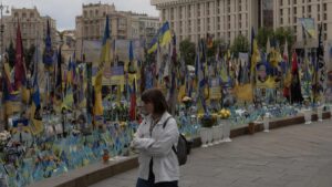 A woman visits a memorial for the fallen Ukrainian and foreign fighters on the Independence Square in Kyiv, Ukraine, May 14, 2025. (AFP Photo)