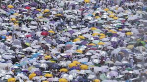 Muslim pilgrims use umbrellas to shield themselves from the sun as they gather outside the Nimrah Mosque to offer the noon prayers in Arafat, on the second day of the annual hajj pilgrimage, near the holy city of Mecca, Saudi Arabia, June 15, 2024. (AP Photo)