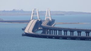 A view shows the Crimean Bridge, a section of which was damaged by an alleged overnight attack, as seen from the city of Kerch, Crimea, Ukraine, July 17, 2023. (Reuters Photo)