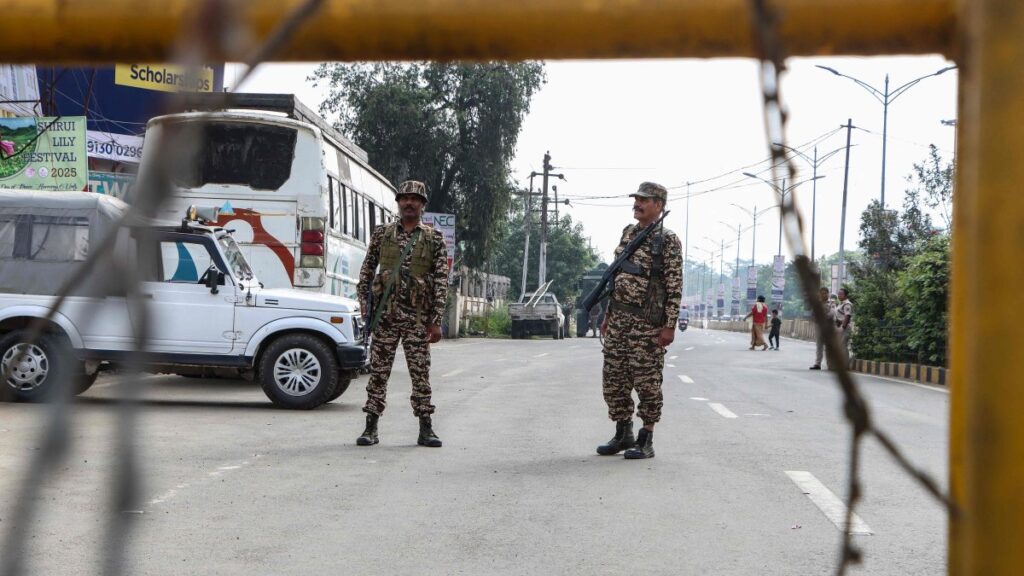 Security personnel stand guard at a checkpoint after a curfew was imposed following recent violence in Imphal, Manipur state, India, June 8, 2025. (AFP Photo)