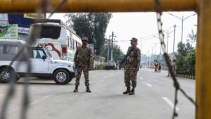 Security personnel stand guard at a checkpoint after a curfew was imposed following recent violence in Imphal, Manipur state, India, June 8, 2025. (AFP Photo)