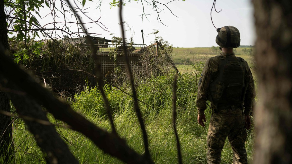 A Ukrainian soldier watches on during extraction training at an undisclosed location in eastern Ukraine, June 6, 2025. (AFP Photo)