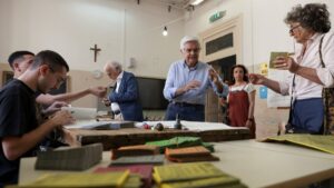 People prepare to vote during a referendum on employment and Italian citizenship at a polling station in Rome, Italy, June 8, 2025. REUTERS/Matteo Minnella