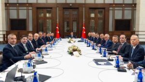 Vice President Cevdet Yılmaz (C) and other officials pose for a photo before the Economic Coordination Board (EKK) meeting in Ankara, Türkiye, June 11, 2025. (AA Photo)