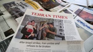 The front page of an Iranian newspaper is seen at a newsstand in Tehran, Iran, on June 16, 2025. (AA Photo)