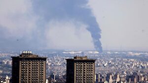 Smoke billows in the distance from an oil refinery following an Israeli strike on the capital, Tehran, Iran, June 17, 2025. (AFP Photo)