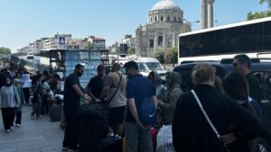 Iranian nationals waiting to board a bus to Iran, Istanbul, Türkiye, June 16, 2025. (İHA Photo)