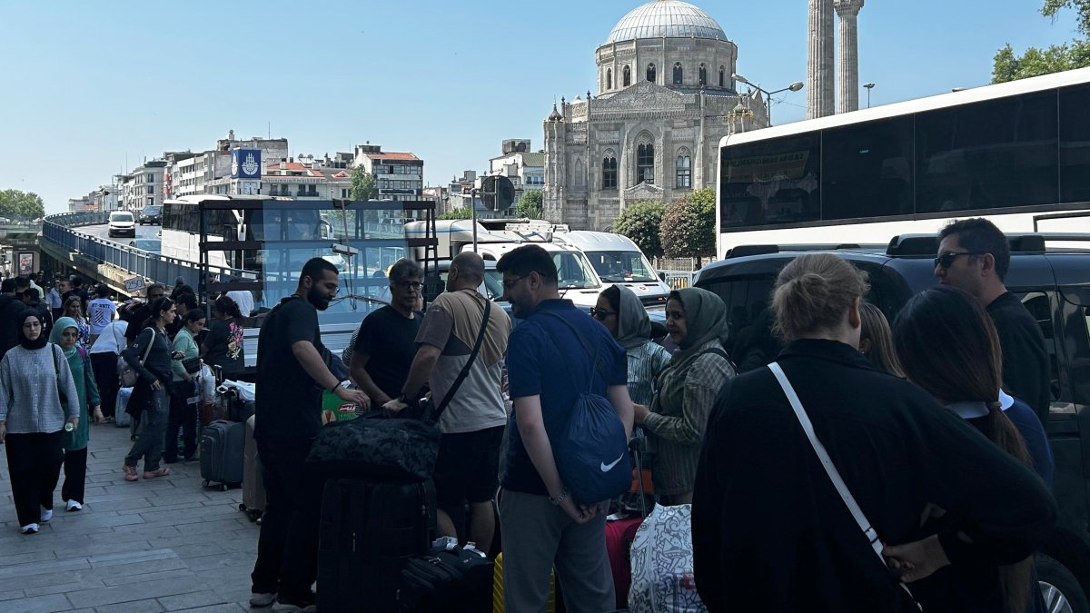 Iranian nationals waiting to board a bus to Iran, Istanbul, Türkiye, June 16, 2025. (İHA Photo)
