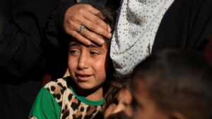 A mourner reacts during the funeral of Palestinians killed by Israeli fire while seeking aid in northern Gaza, Palestine, June 18, 2025. (Reuters Photo)