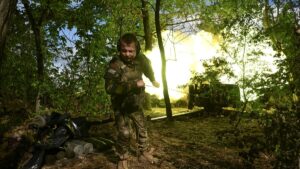 A service member of the 110th Separate Brigade of the Territorial Defense Forces of the Ukrainian Armed Forces fires a howitzer towards Russian troops, amid Russia's attack on Ukraine, at a front line in Zaporizhzhia region, Ukraine, June 16, 2025. (Reuters Photo)