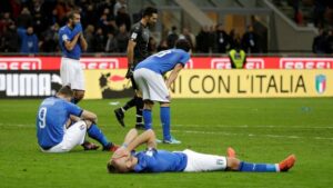 Italy players look dejected after the match. Reuters