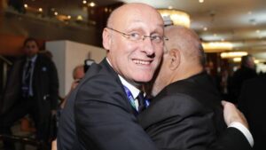 French rugby president Bernard Laporte celebrates after France is named to host the 2023 Rugby World Cup in London on November 15, 2017.
