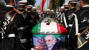 Members of Iranian forces carry the coffin of Iranian nuclear scientist Mohsen Fakhrizadeh during a funeral ceremony in Tehran, Iran on November 30, 2020.