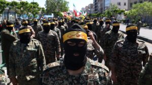 Members of the Islamic Revolutionary Guard Corps (IRGC) force attend a rally in Tehran.