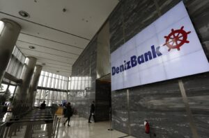The logo of Denizbank is displayed on a screen at the bank's headquarters in Istanbul, Türkiye, March 2, 2016. (Reuters Photo)