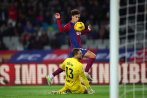 Barcelona's Joao Felix scores past Atletico Madrid's Jan Oblak during the La Liga match at Estadi Olimpic Lluis Companys, Barcelona, Spain, Dec. 3, 2023. (Getty Images Photo)