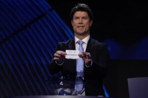 Special guest Brian Laudrup pulls out the card of Switzerland during the UEFA EURO 2024 Final Tournament Draw at Elbphilharmonie, Hamburg, Germany, Dec. 2, 2023. (Getty Images Photo)